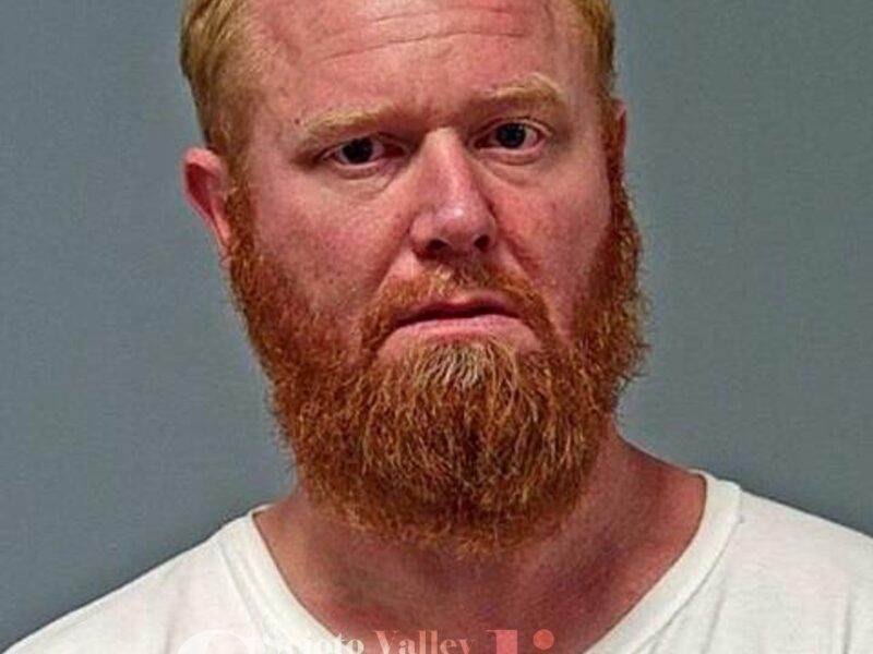 Davis, Travis M