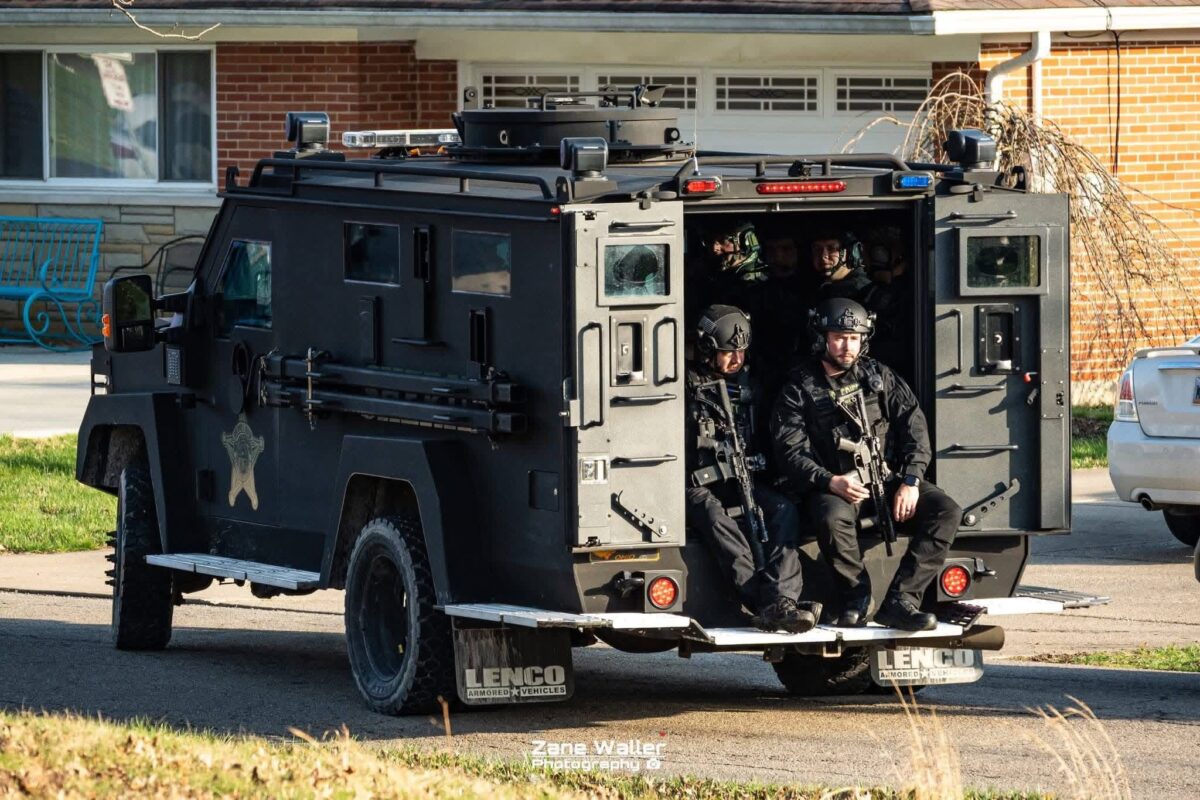 An armored vehicle from the Clermont County Sheriff's Office is scene at a SWAT raid.