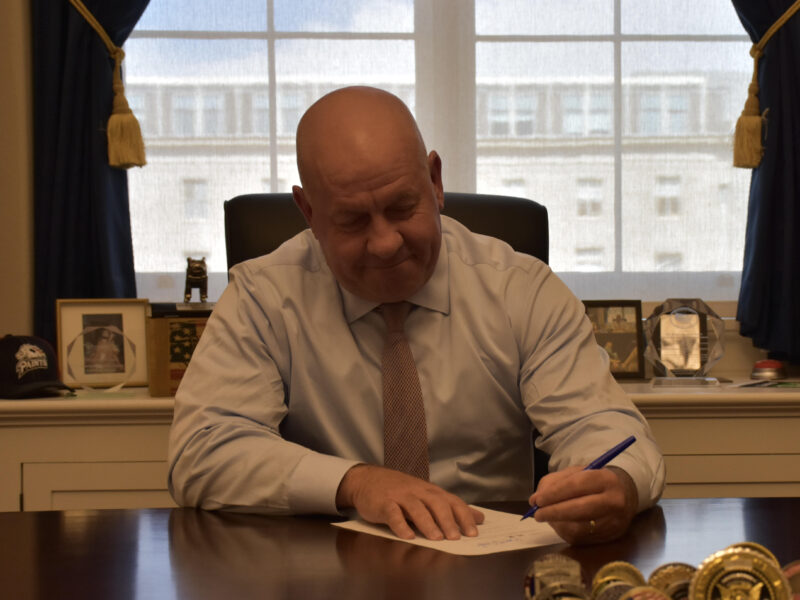 Congressman Dave Taylor signs his support onto a bill that would uncover SNAP fraud.