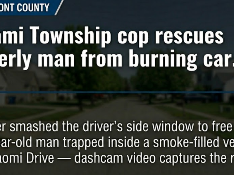 Miami Township cop pulls man from burning car