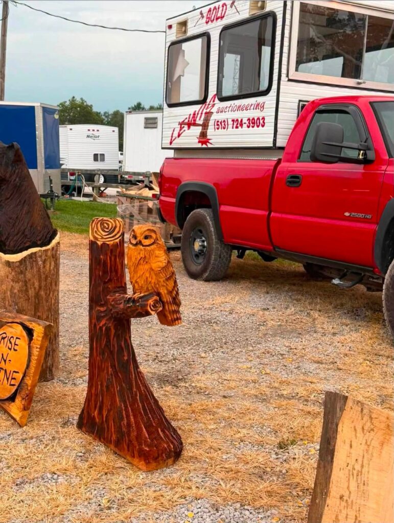 A carved owl stands ready for Saturday's auction at the Clermont County Fair