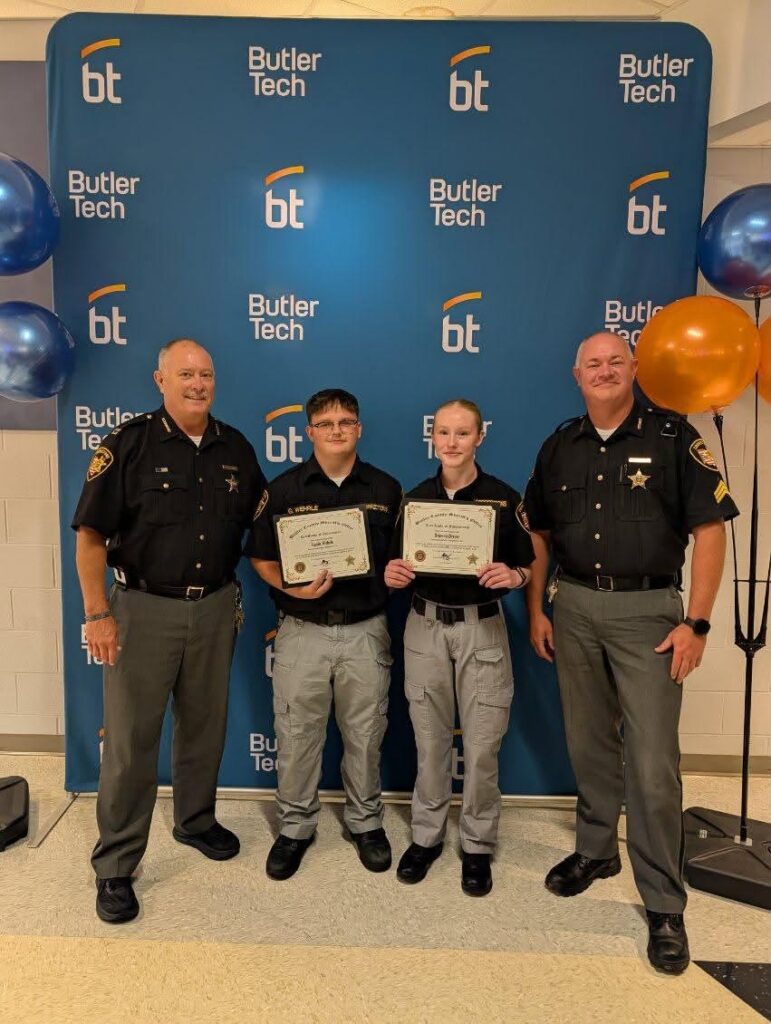 Officers Dreyer and Wehrle graduate corrections academy