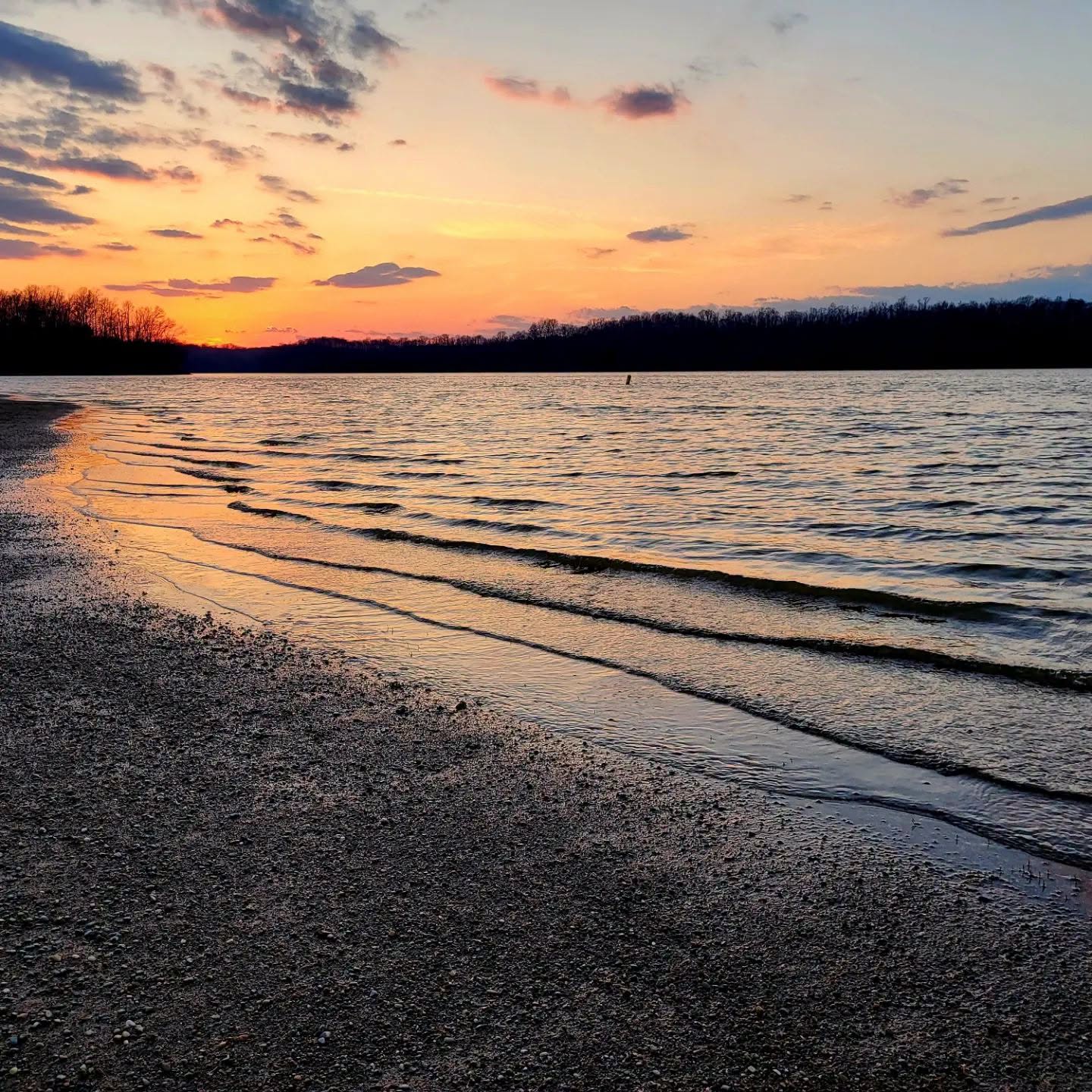 Sunset along a Clermont County lake beach