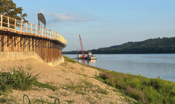 A crane works on the marina installation along the Ohio River at Liberty Landing