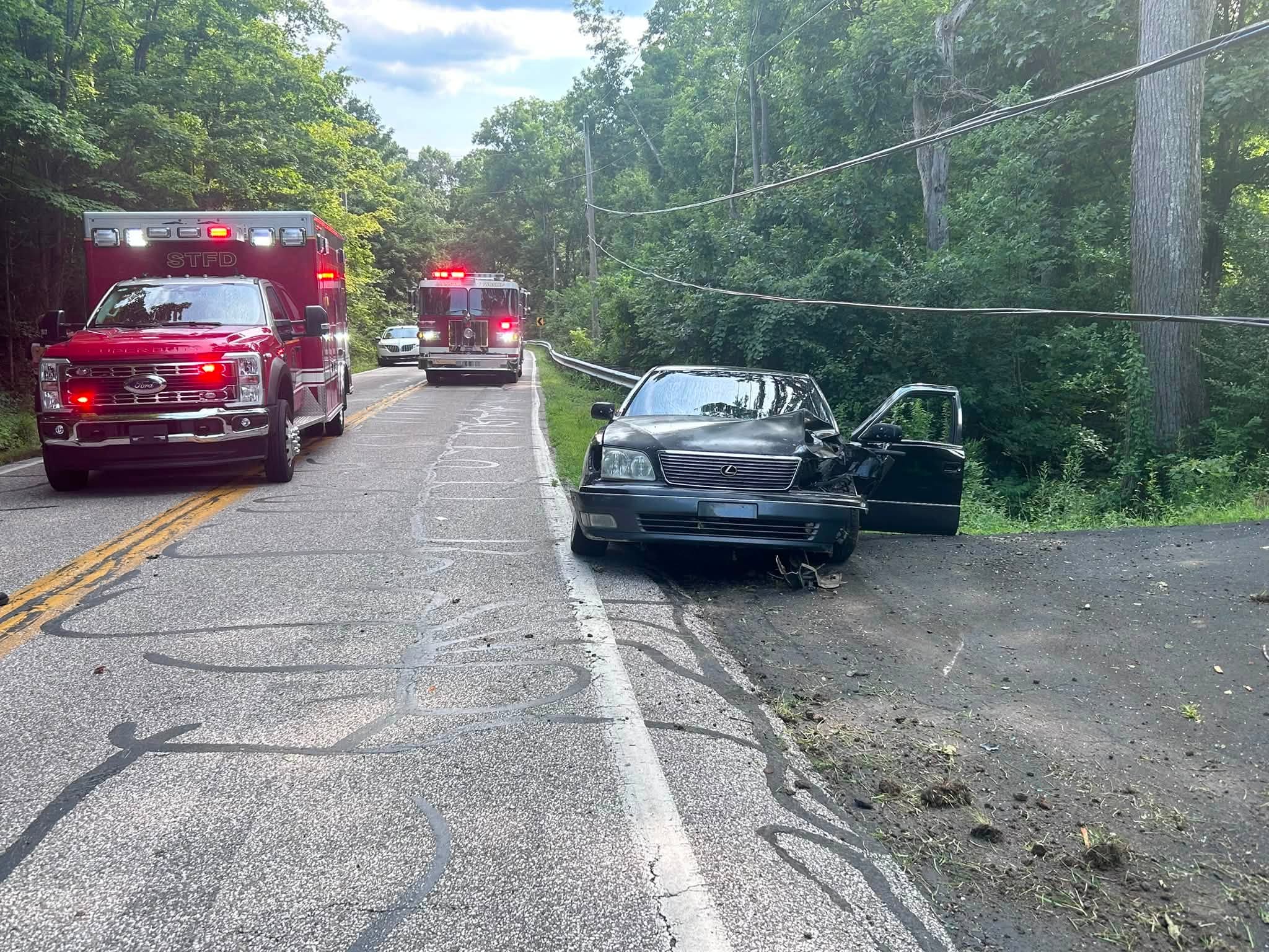 Damaged car after crash on Newtonsville-Hutchinson Road