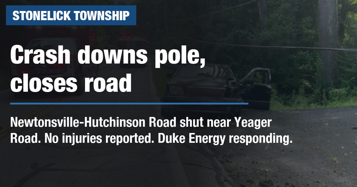 Crash downs pole, closes road