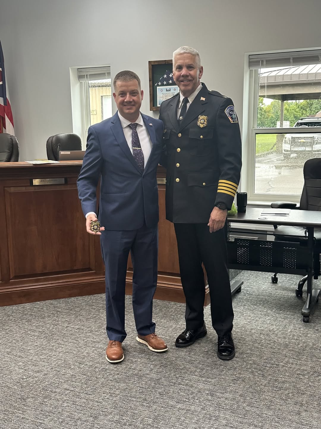 Chief Paul Broxterman swears in Assistant Chief Justin Schultz