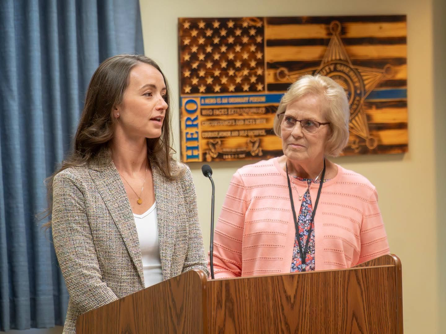 Queen City Farms owner LeeAnn Wells speaks after receiving proclamation