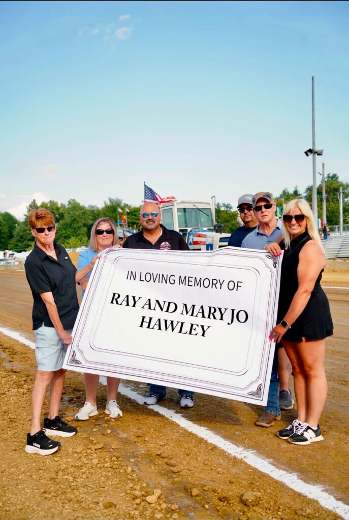 Family unveils sign honoring Ray and Mary Jo Hawley at Clermont County Fairgrounds