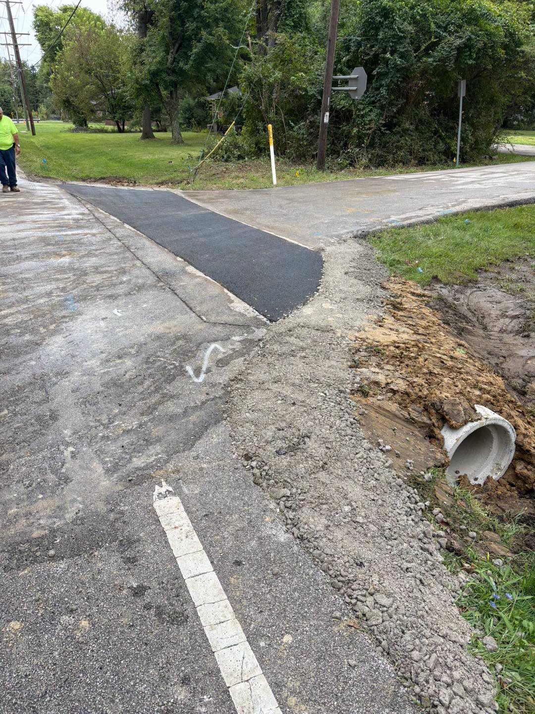 New pavement at Clough Pike and Dixie Drive after culvert replacement