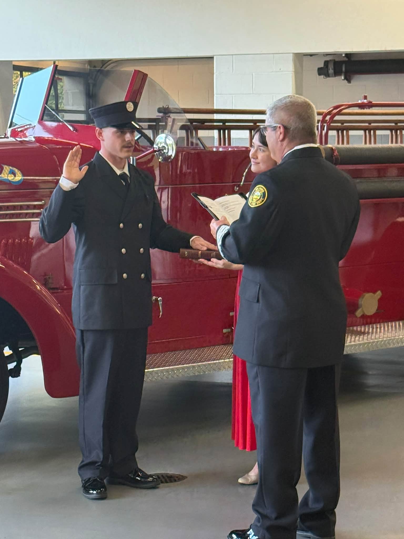 Kaiden Hartness sworn in as career firefighter/EMT at Milford