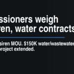 Commissioners weigh alert siren, water contracts