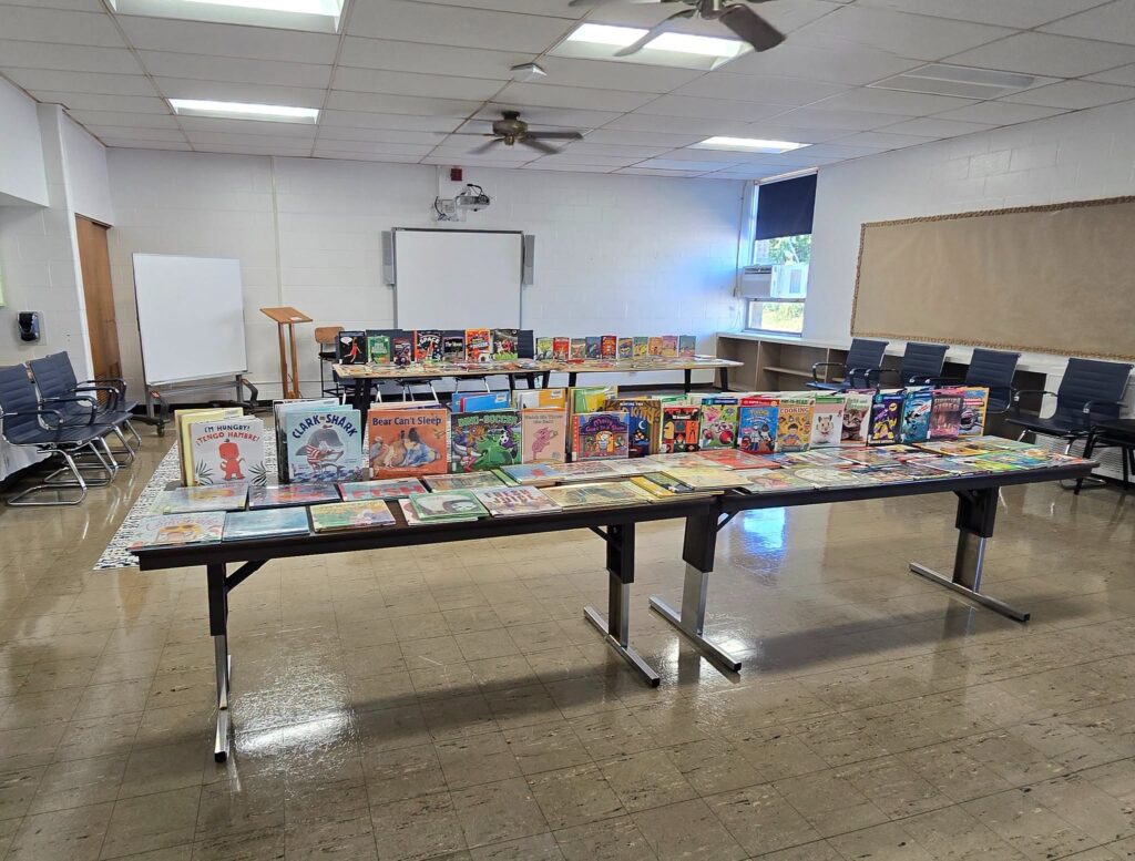 Books laid out for Clermont County Public Library's 3 For Me program