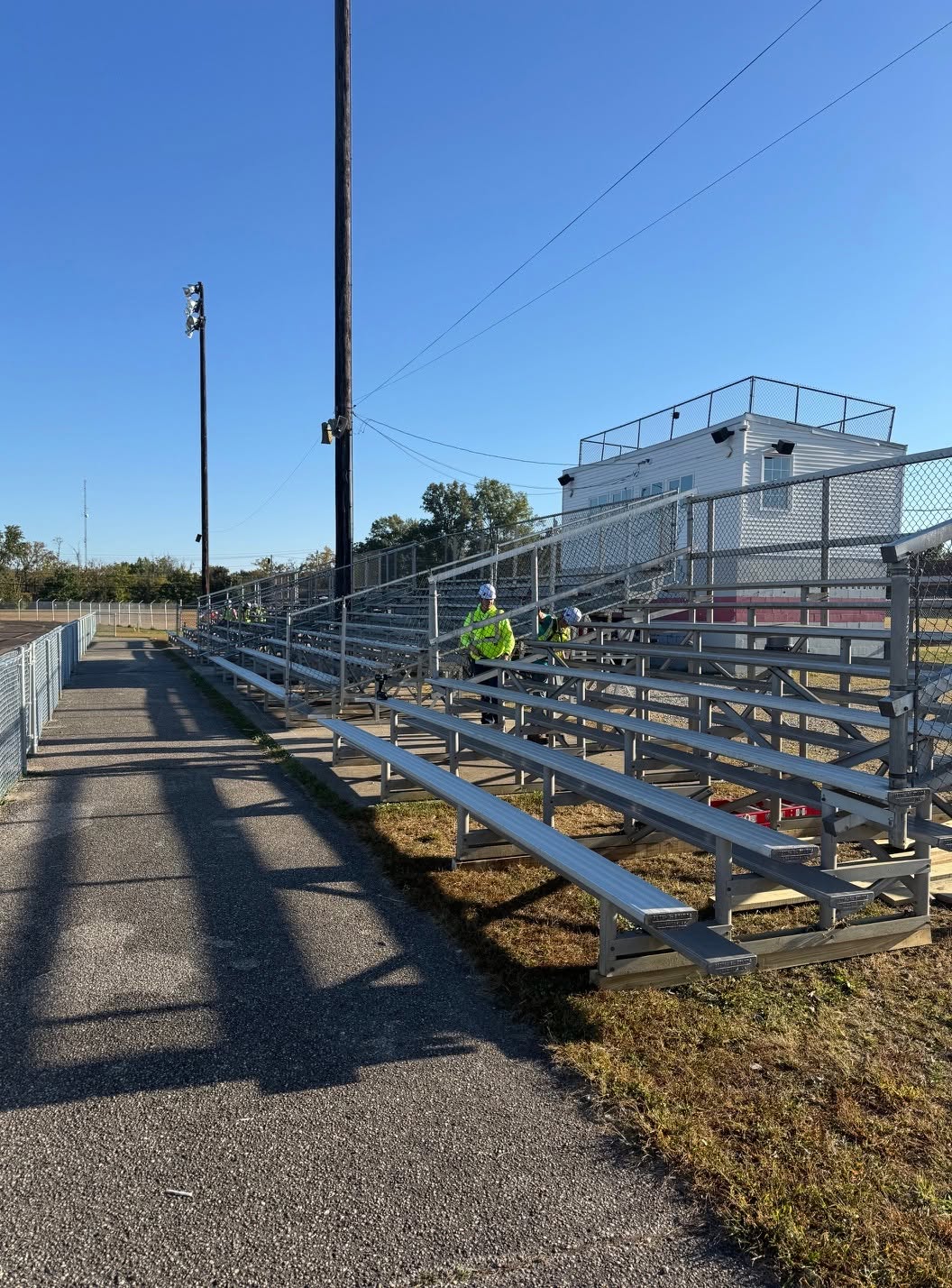 Crews assemble new bleachers at Bethel-Tate Middle School stadium