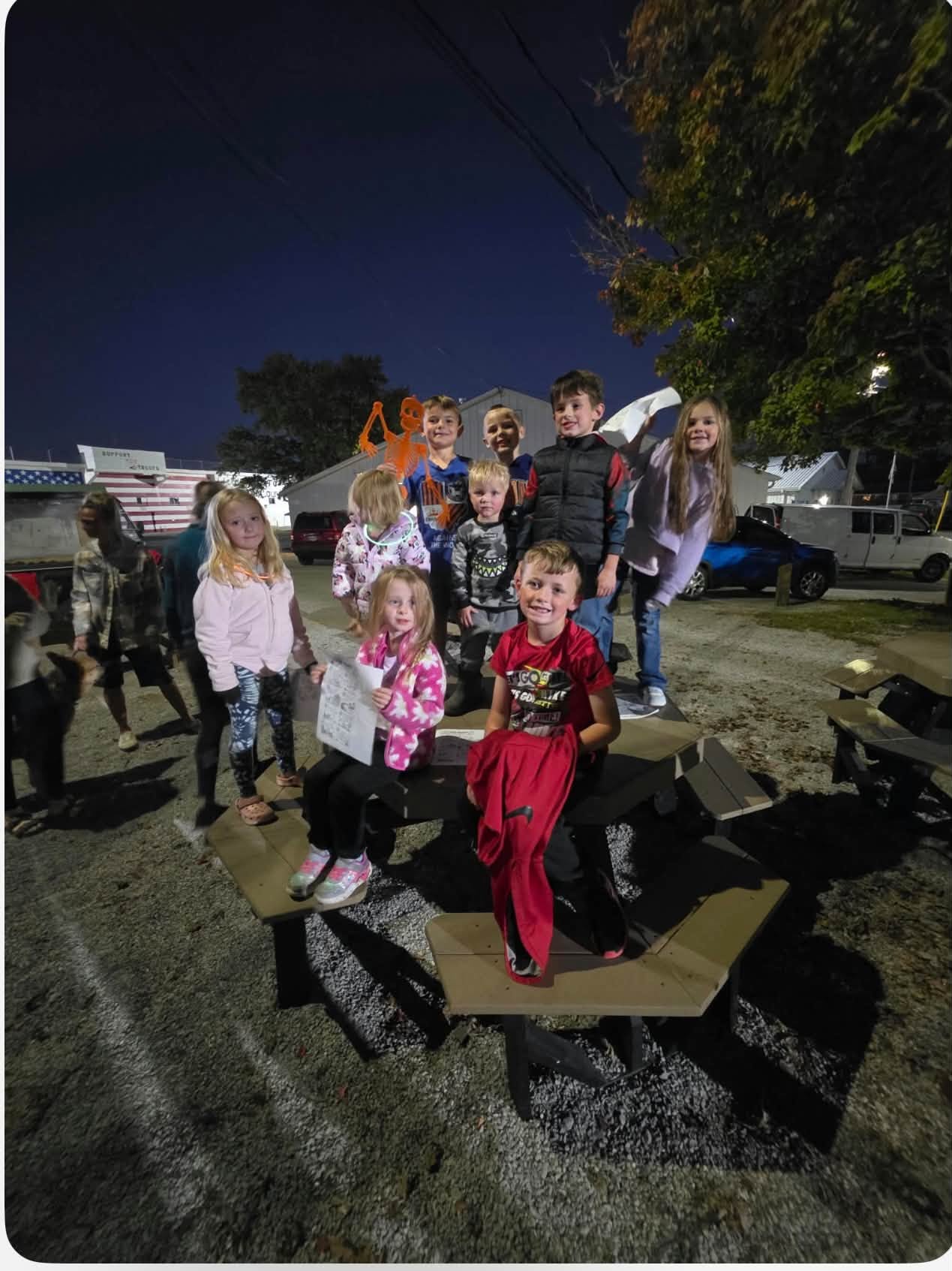 Campers pose with their assembled skeleton at the Clermont County Fairgrounds