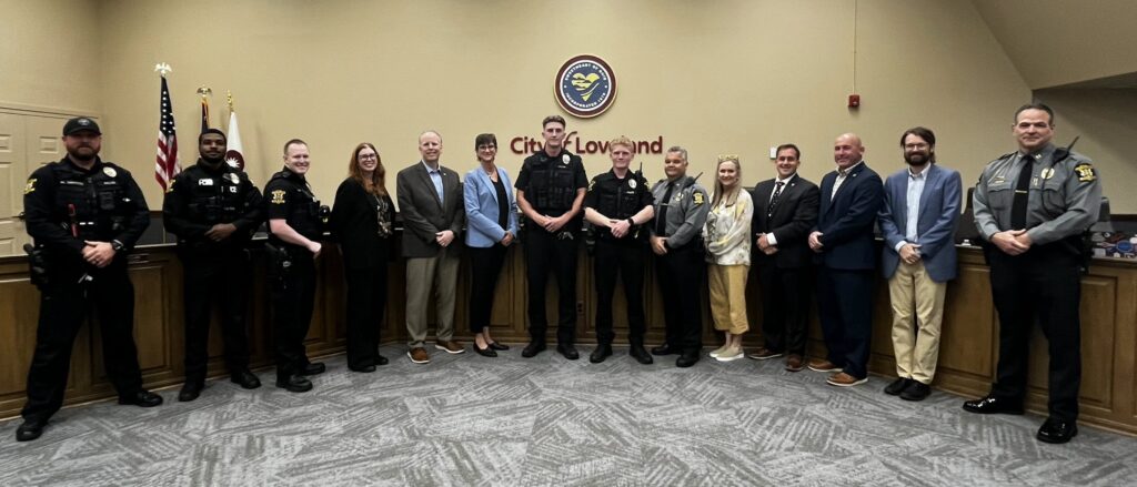 Mayor Kathy Bailey swears in Loveland police officers Hayden Burns and Trey Williams