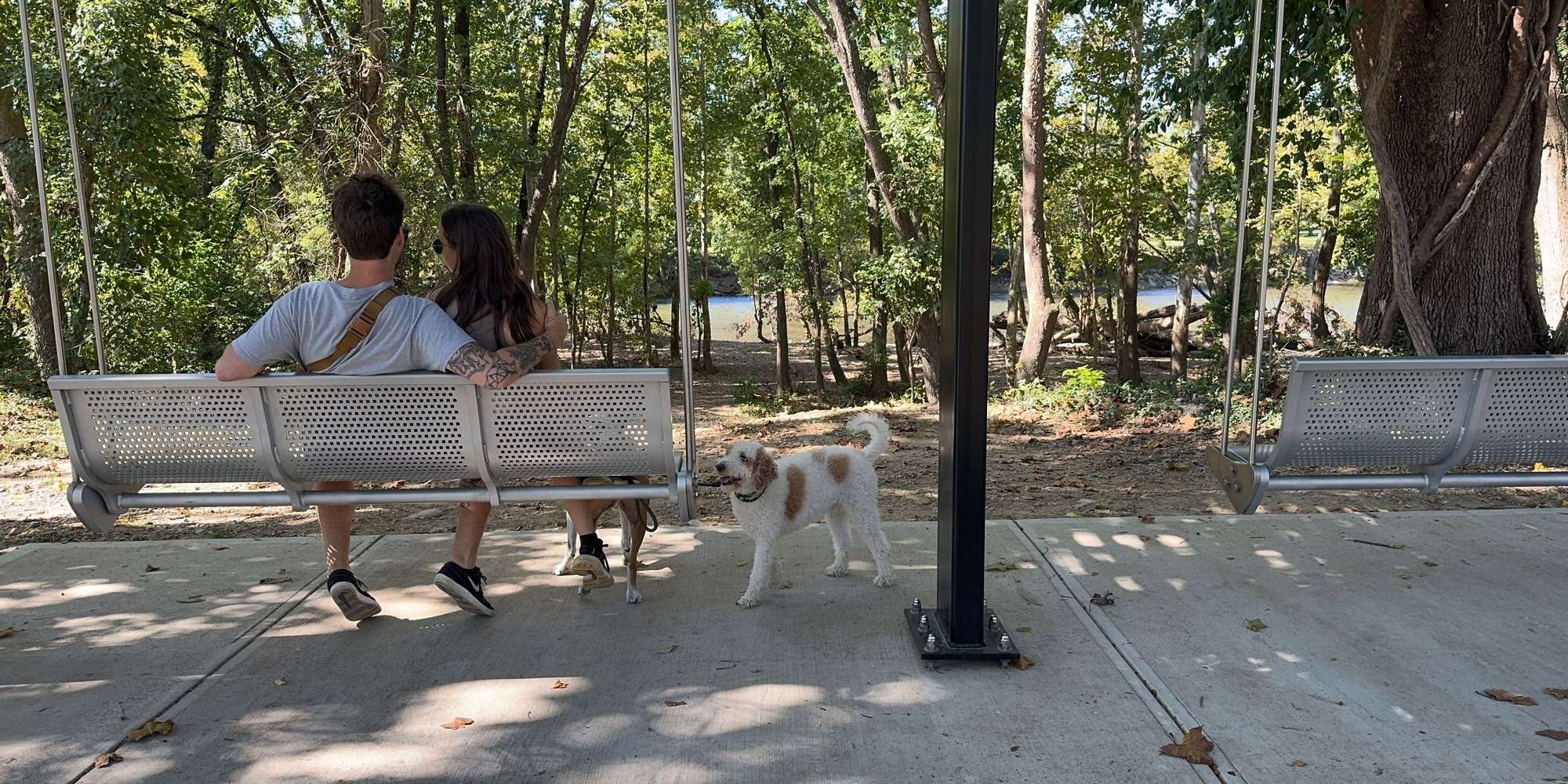 Visitors relax at Nisbet Park overlooking the Little Miami River