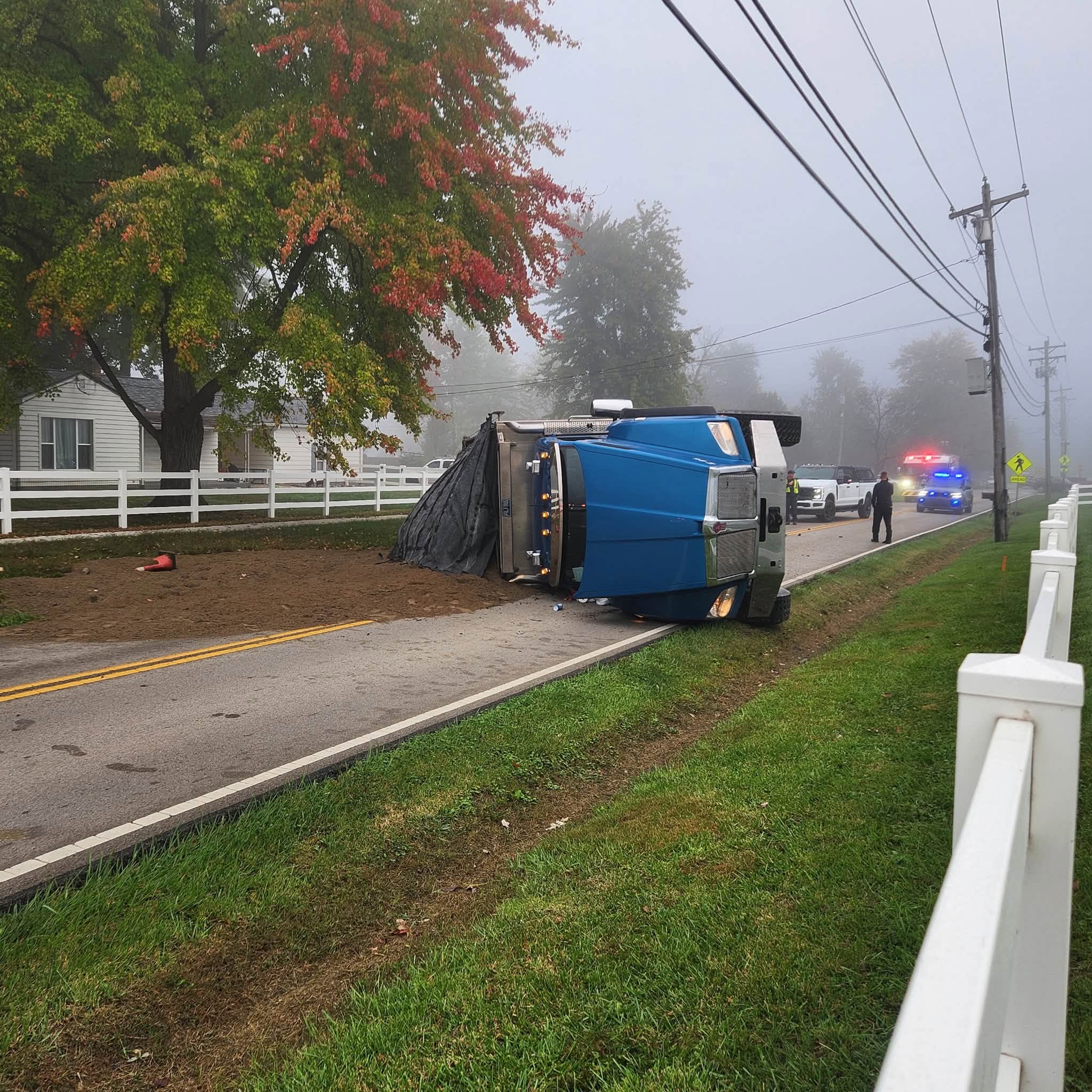Overturned tractor-trailer blocks Clough Pike in Batavia Township