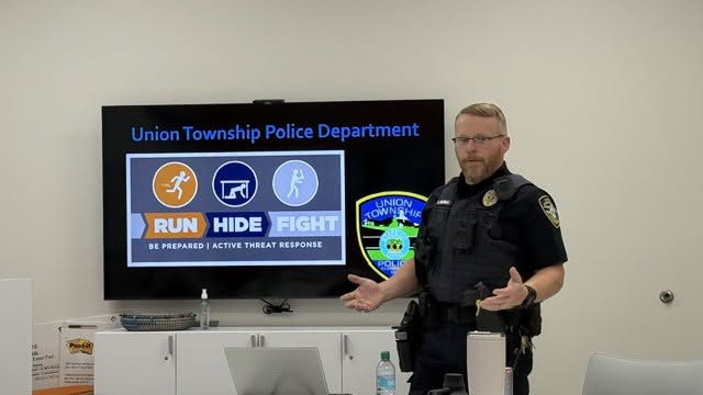 Officer Siekbert teaches Run, Hide, Fight at IPM Food Pantry